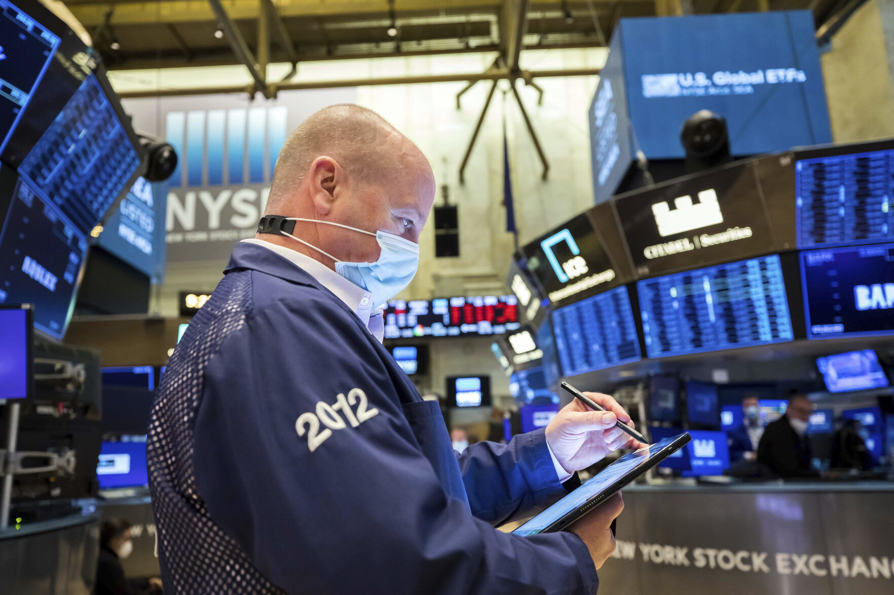 Masked trader at stock exchange